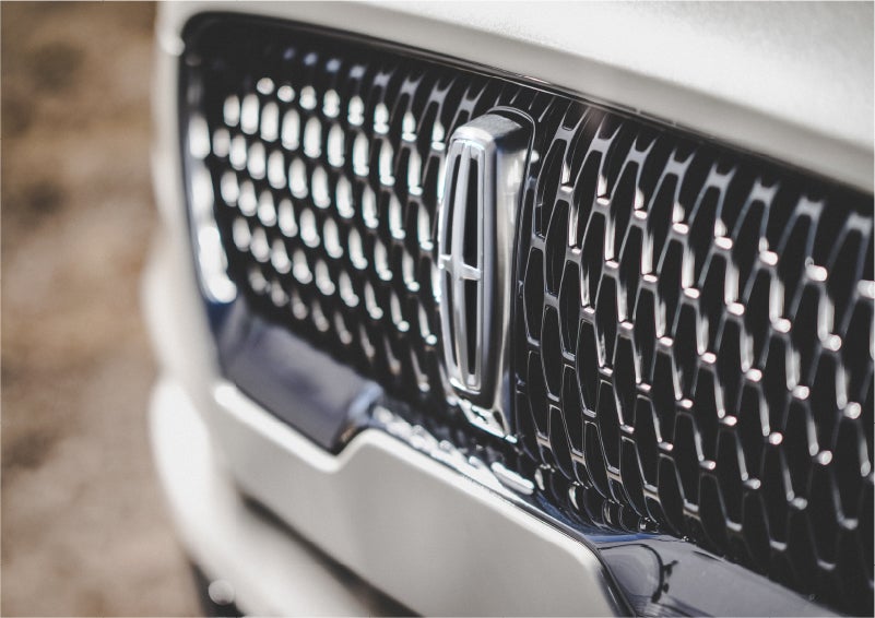The grille of the 2023 Lincoln Aviator® Reserve model with an eye-catching repeated field of Lincoln Star logo shapes | Spitzer Lincoln DuBois in Du Bois PA