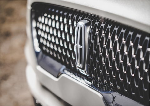 The grille of the 2023 Lincoln Aviator® Reserve model with an eye-catching repeated field of Lincoln Star logo shapes | Spitzer Lincoln DuBois in Du Bois PA