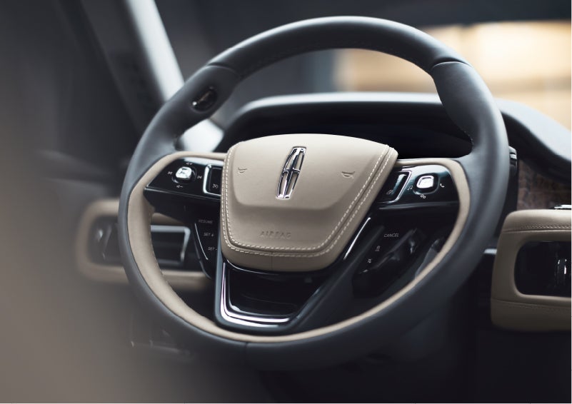 The intuitively placed controls of the steering wheel on a 2023 Lincoln Aviator® SUV | Spitzer Lincoln DuBois in Du Bois PA