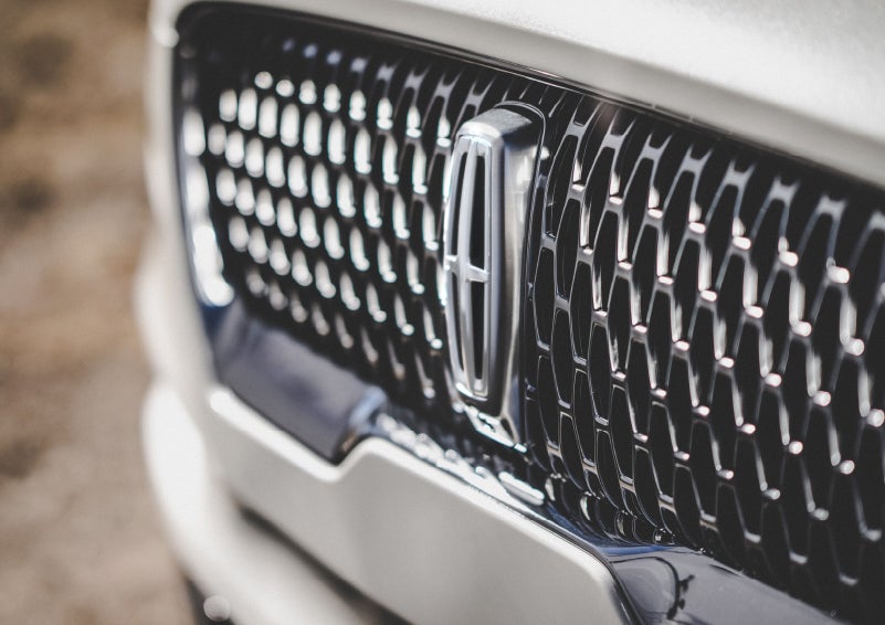 The grille of the 2024 Lincoln Aviator® Reserve model with an eye-catching repeated field of Lincoln Star logo shapes | Spitzer Lincoln DuBois in Du Bois PA