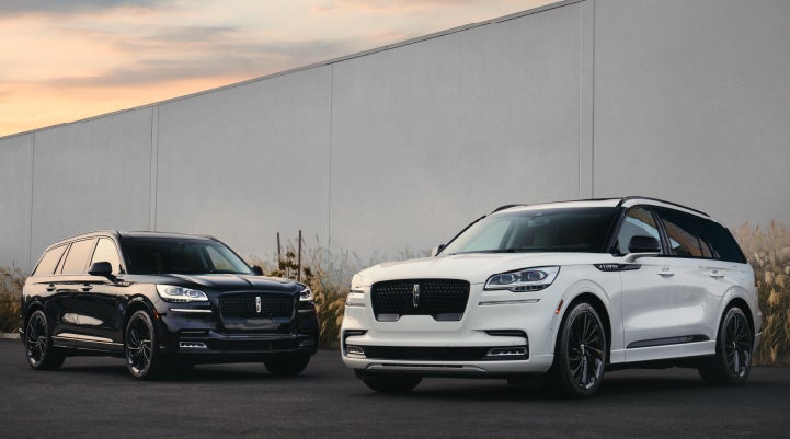 Two Lincoln Aviator® SUVs are shown with the available Jet Appearance Package | Spitzer Lincoln DuBois in Du Bois PA