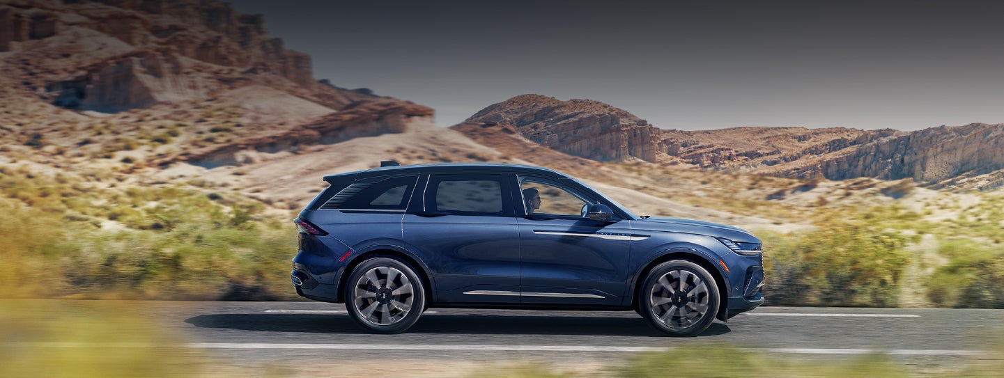 A 2024 Lincoln Nautilus® SUV is being driven in a desert setting. | Spitzer Lincoln DuBois in Du Bois PA