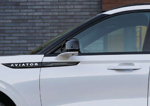 The driver’s door of a white 2025 Lincoln Aviator® SUV is showcased. | Spitzer Lincoln DuBois in Du Bois PA