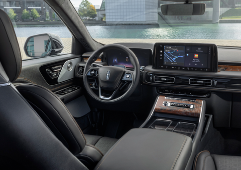 The interior of the 2025 Lincoln Aviator® SUV is shown parked with a view of a harbor through the windshield. | Spitzer Lincoln DuBois in Du Bois PA