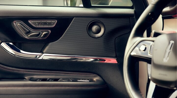 A Revel® audio speaker is shown in the driver's side door of a 2025 Lincoln Corsair® SUV. | Spitzer Lincoln DuBois in Du Bois PA