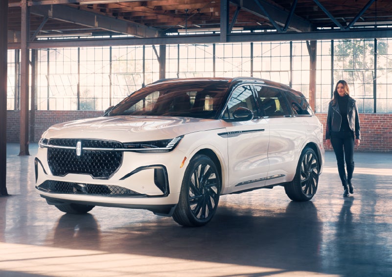 A person approaches a 2025 Lincoln Nautilus® SUV. | Spitzer Lincoln DuBois in Du Bois PA