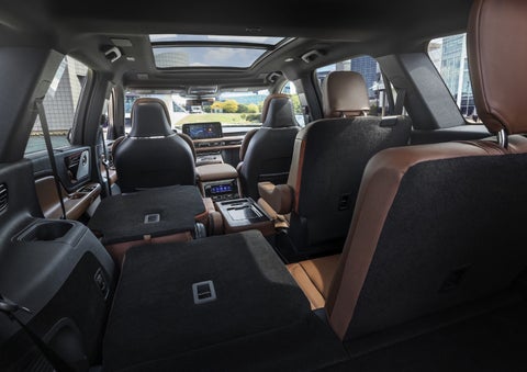 One side of the PowerFold® third-row seat and a second-row seat are folded forward in the 2026 Lincoln Aviator® SUV. | Spitzer Lincoln DuBois in Du Bois PA
