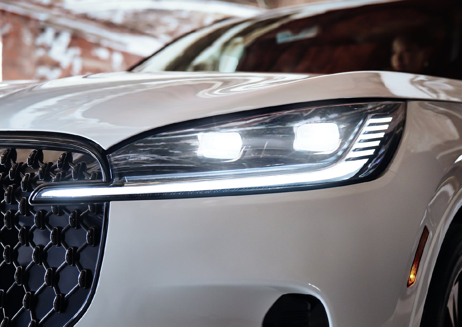 A close-up of a headlamp on the 2027 Lincoln Aviator® SUV is shown. | Spitzer Lincoln DuBois in Du Bois PA