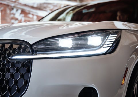 A close-up of a headlamp on the 2027 Lincoln Aviator® SUV is shown. | Spitzer Lincoln DuBois in Du Bois PA