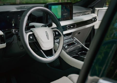 The leather-trimmed steering wheel of a 2027 Lincoln Aviator® Black Label™ SUV. | Spitzer Lincoln DuBois in Du Bois PA